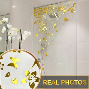 Detail of 3D gold mirror wisteria flowers and butterfly wall stickers on glass