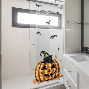 Adesivo Halloween con gatto in zucca applicato su porta in vetro della doccia