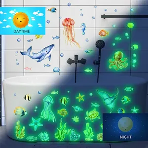 Luminous marine animal wall stickers showing day and night effects for bathroom decor