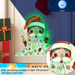 Sticker mural de Noël fluorescent avec comparaison jour et nuit et effet lumineux vert