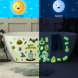 Luminous Halloween wall stickers with glowing pumpkin and ghost patterns for home decor