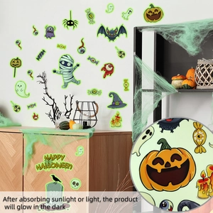 Detailed view of glow in the dark Halloween wall stickers with pumpkin and ghost motifs