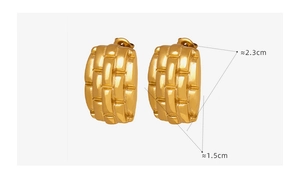 Detail view of woven texture gold titanium earrings with dimensions 2.3cm by 1.5cm