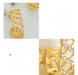 Detailed view of hollow grid earrings with Czech diamonds and 18K gold plating