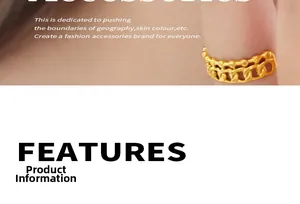 Detail of double-layered gold ring with bead and chain pattern on finger