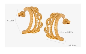 Macro view of gold-plated twisted C-hoop earrings with layered texture and 1.7cm height