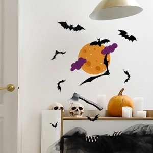 Halloween wall stickers featuring black bats, orange moon, and purple clouds on white wall