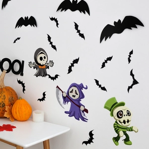 Detail of Halloween wall stickers featuring bats, reaper and skeleton on white wall