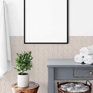 Detail of light beige retro self-adhesive wall tile with 3D floral relief pattern