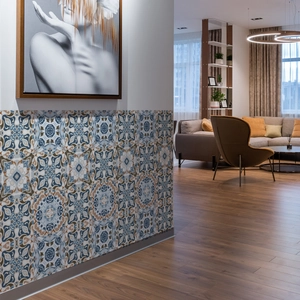 Macro detail of vintage mandala wall decals in blue and brown for home renovation