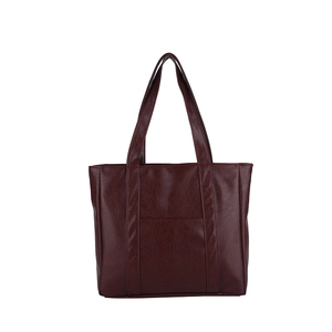 Minimalist burgundy faux leather tote bag with vertical stitching and long shoulder straps
