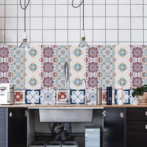 Retro Bohemian tile wall stickers with red floral and blue geometric patterns in a kitchen