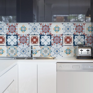 Detailed view of vintage mandala tile stickers on a modern kitchen backsplash wall