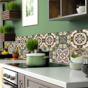Detail showing vintage Moroccan tile stickers with green mandala patterns on kitchen wall