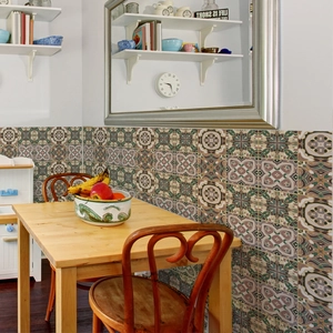 Detailed retro mandala tile stickers on a kitchen wall with geometric floral patterns