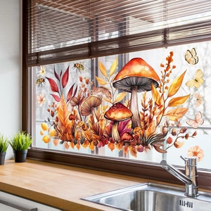 Stickers de fenêtre aquarelle champignons et papillons posés sur une vitre de cuisine