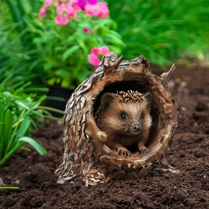 Detailed realistic hedgehog in tree hole resin ornament for garden lawn decoration