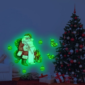 Glow-in-the-dark Christmas wall stickers featuring Santa Claus and glowing holiday ornaments