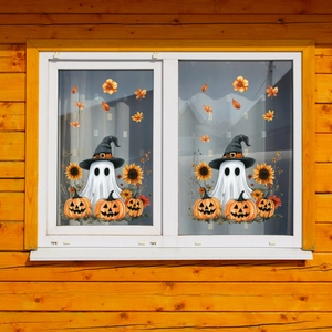 Detail of Halloween window stickers featuring ghosts, pumpkins and sunflowers on glass