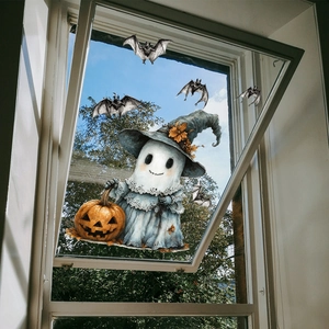 Ghost and pumpkin Halloween window decals applied to clear glass with bat accents