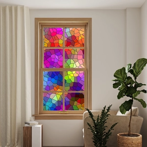 Detail of colorful mosaic static window film with geometric floral pattern for home privacy