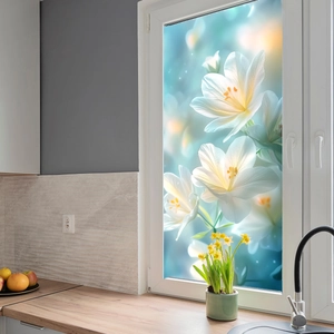 Detail of static window film showing white lily patterns on frosted translucent glass