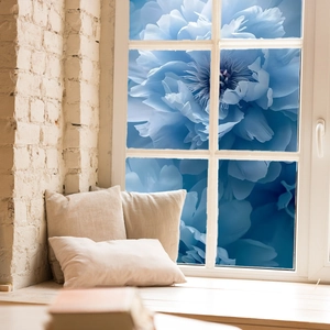 Detail of blue floral privacy window film with double-sided visible peony patterns
