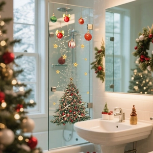 Detail of Christmas tree and hanging ball glass stickers on a bathroom mirror