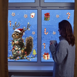Christmas squirrel window decal showing cozy festive home decor with stars and gift boxes