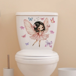 Luminous fairy and butterflies wall decals applied on a white toilet tank in bathroom