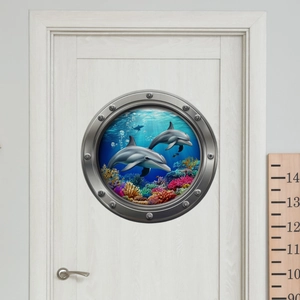 3D porthole wall sticker featuring dolphins and coral reef on a white interior door