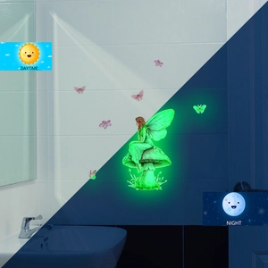 Luminous fairy wall sticker showing day and night glow effect on bathroom tiles
