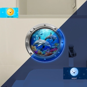 Luminous blue dolphin wall stickers showing 3D porthole effect in day and night environments