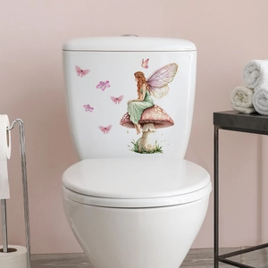 Close-up of a fairy and butterflies sticker applied to a white toilet tank