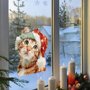 Christmas window static sticker featuring an orange cat in a Santa hat with snowflakes