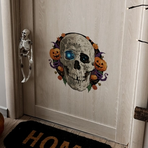 Détail d'autocollant de porte Halloween phosphorescent avec crâne et citrouilles