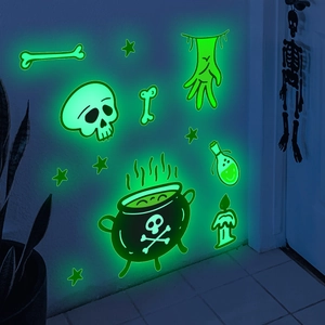 Detailed view of luminous Halloween wall stickers showing skeleton and witch elements