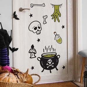 Detailed Halloween wall decals featuring green witch cauldron and spooky elements on a white door