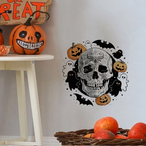 Sticker mural Halloween avec crâne, citrouilles et chauves-souris sur un mur blanc