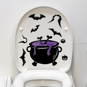 Detail von Halloween Toilettenaufklebern mit schwarzem Kessel, Fledermäusen und Kürbissen