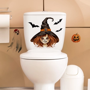 Detail view of Halloween toilet stickers with ghost, pumpkin and witch girl patterns