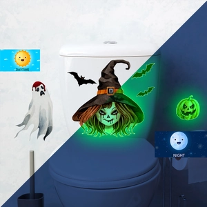 Luminous Halloween wall stickers showing contrast between daytime and night glow effect