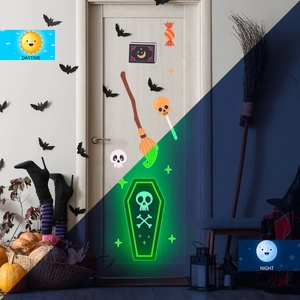 Luminous Halloween wall stickers showing contrast between daytime and green glow at night