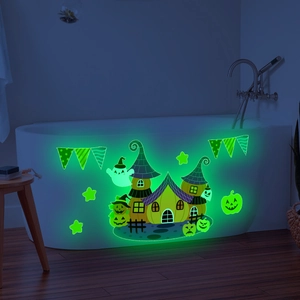 Luminous Halloween wall stickers featuring a glowing castle, ghosts, and pumpkins in dark