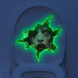 Close-up of 3D glowing green zombie face sticker with realistic blood on a toilet lid