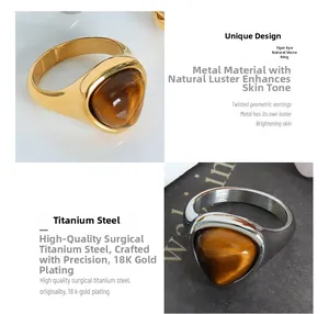 Detailed view of 18K gold plated titanium steel ring with triangle tiger eye stone inlay