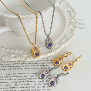 Ensembles de colliers et boucles d'oreilles ovales dorés et argentés avec cristaux colorés