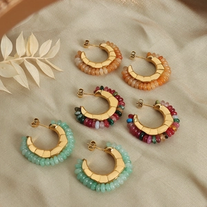 Gold-plated C-shaped earrings with colorful natural stones and geometric grooves