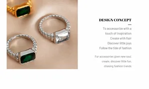Detail-Makro von goldenen und silbernen Vintage-Ringen mit Smaragd und klaren Steinen