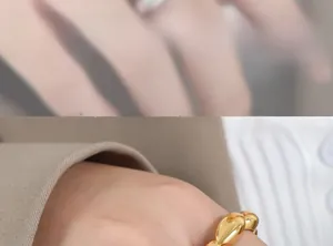 Close-up of model wearing a gold punk style 18k gold plated bubble bead open ring